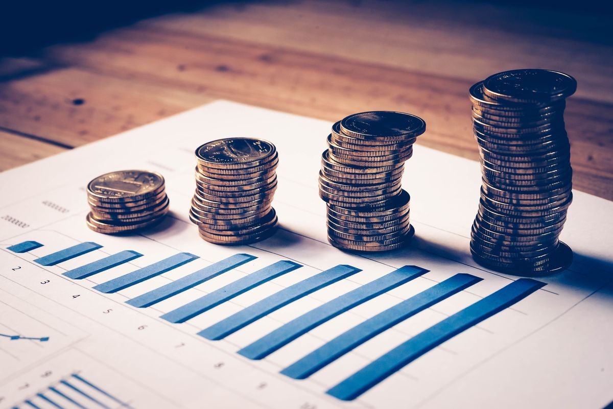 Personal financial planning concept. Businessman workplace with papers for financial planning. Business people discussing the charts and graphs showing the results of successful financial planning. Personal financial planning concept. Businessman workplace with papers for financial planning. Business people discussing the charts and graphs showing the results of successful financial planning.
